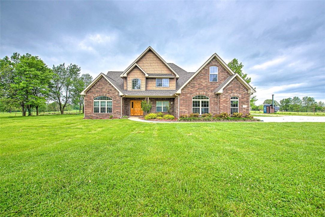 Welcome to your perfect blend of privacy and convenience on Spring Creek! This charming home sits on 2 beautiful acres with a tree-lined front that creates a peaceful, secluded feel. Inside, you’ll love the original hardwood floors and cozy eat-in kitchen, full of character and warmth. Need space? This property offers ample storage, including a large shop—perfect for hobbies, projects, or extra equipment. Enjoy the best of both worlds with a convenient location just minutes from the highway, while still embracing that quiet country lifestyle. A rare find with charm, space, and functionality all in one!