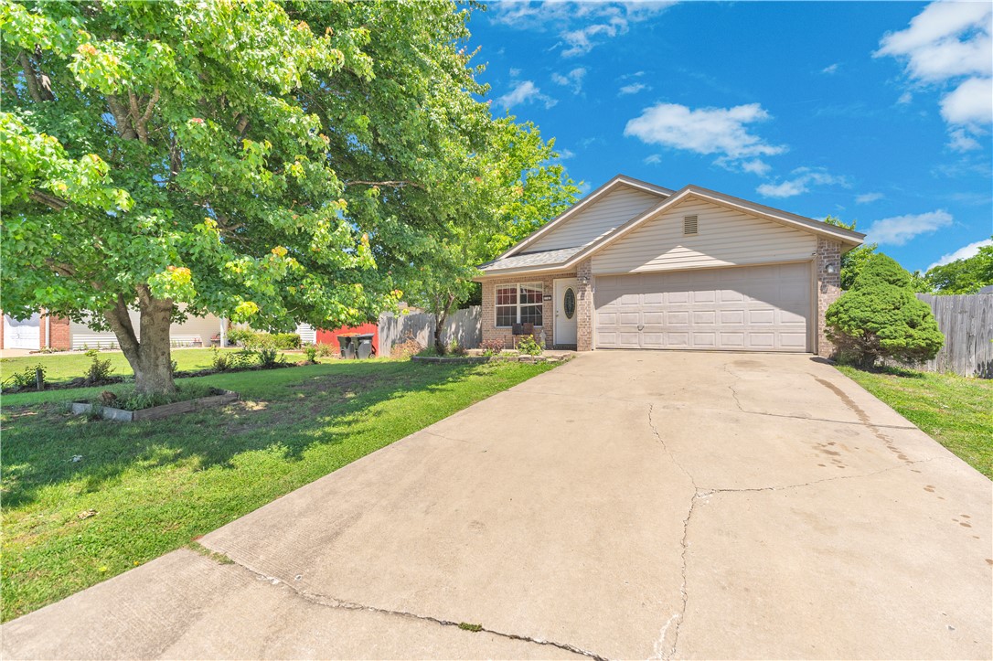 Welcome home to this charming 3 bedroom, 2 bathroom home located in the desirable Park Place subdivision! Conveniently situated near shopping, dining, and everyday amenities, this home offers comfort and convenience all in one. Inside you’ll find durable tile flooring throughout, a spacious kitchen with tons of cabinet space, and a functional open layout perfect for everyday living. The primary suite features a double vanity bathroom, while the privacy fenced backyard provides plenty of space to relax, entertain, or enjoy pets and family gatherings. Don’t miss this great opportunity in Springdale!