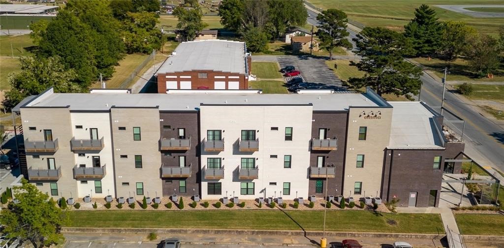Experience stylish living in this beautifully designed 1 bed, 1 bath apartment located in Springdale. Just steps away from restaurants, shopping, local attractions, parks, and scenic trails. This modern unit features 10 ft ceilings, granite countertops, stainless steel appliances, a tile backsplash, washer and dryer, and keyless entry for convenience. Tenants will be charged a $135 amenities package that includes water, sewer, trash, high-speed internet, smart locks — everything you need for comfortable living! Don't miss your chance to live in this vibrant and walkable community. We process applications as we receive and once an application is approved, we reach out for deposit. Deposit secures the unit not the application. Please be aware of scams. Our application process is to be paid online through a secure portal, and we do not accept cash, CashApp, Venmo, and/or PayPal. Pictures of like unit - same layout