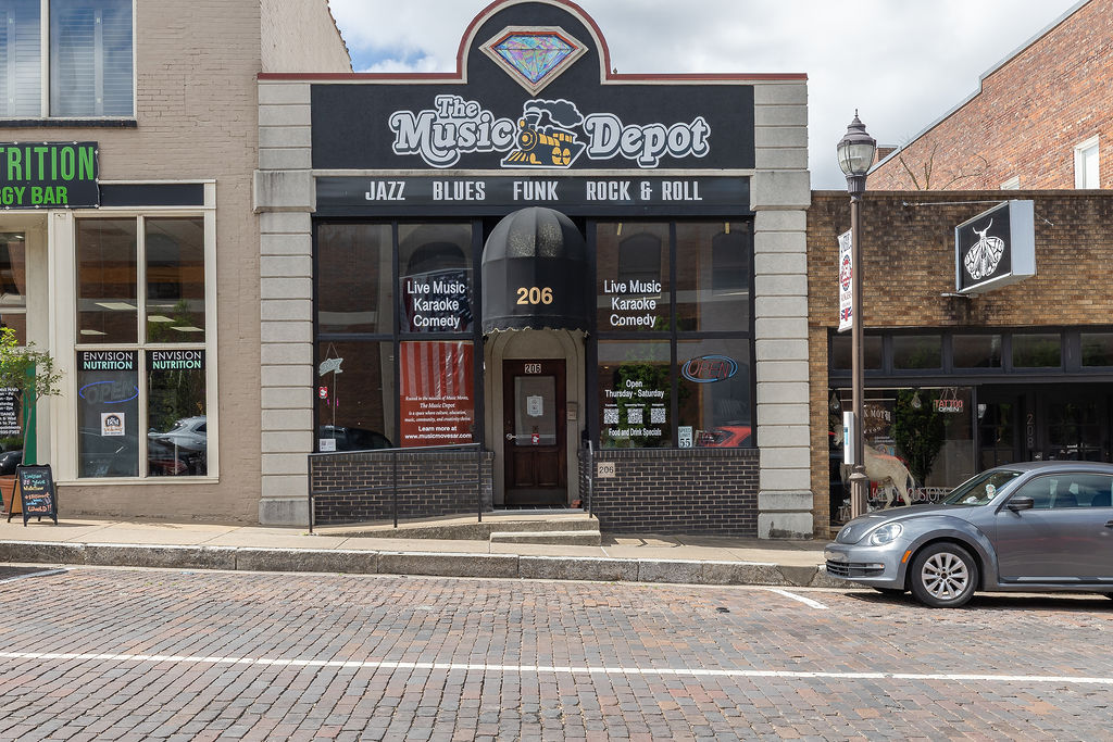 Rare opportunity to own a renovated historic commercial building in Downtown Rogers' Entertainment District. Built in 1909, but totaly restored and brought up to code in 1995, this 3,672 SF property offers excellent visibility on W Walnut Street on the bricks. The main level features 2,611 SF of commercial space, currently leased to The Music Depot, while the upper level provides 1,061 SF ideal for living quarters, offices, or additional income potential.

Home to Goldens Designer Jewelry since 1996, the building has been extensively updated with security enhancements, separate HVAC systems for the commercial and upper levels, and a new TPO membrane roof in 2017 with 2' ISO insulatuion. Adjacent to a public parking area, the property offers convenient customer access. Within walking distance of dining, shopping, entertainment, parks, and the Railyard Entertainment District, this property blends historic character with modern functionality in one of Northwest Arkansas' most vibrant downtown locations.