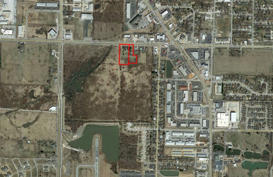 Two parcels of land on 14th Street/Highway 102 in Bentonville, AR.   This is a high traffic area adjacent to Bentonville Plaza office building and less than 0.2 miles from the Walmart Home Office.