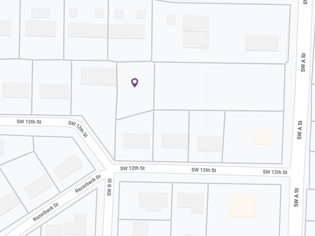 Parcel is 0.26 wooded acres. Would be a great place to build a duplex. Seller does not have easement from neighbors, selling as is.
