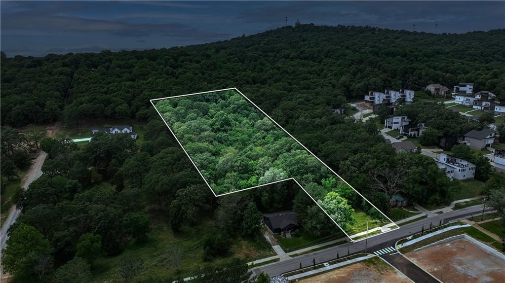 Rare opportunity to own 2 acres in the heart of Fayetteville. Zoned RSF 8. Just minutes to downtown Fayetteville and the U of A.
