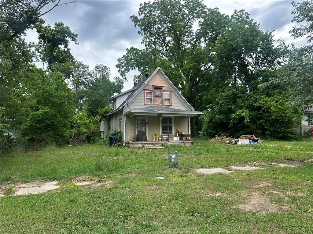 Situated on approximately 1/2 acre in the downtown Rogers area, this property offers incredible potential for investors, renovators, or buyers looking to restore a home in a prime location. Existing home is currently uninhabitable and will require significant repairs or renovation. Property is being sold AS-IS, WHERE-IS with no seller disclosure available.

Enjoy the convenience of being within biking distance to downtown Rogers, local restaurants, shopping, entertainment, and the Razorback Greenway. Rare opportunity to own a larger lot in an area seeing continued growth and revitalization. Buyer to satisfy themselves regarding condition, utilities, zoning, and intended future use. Also listed a vacant land MLS 1347666
