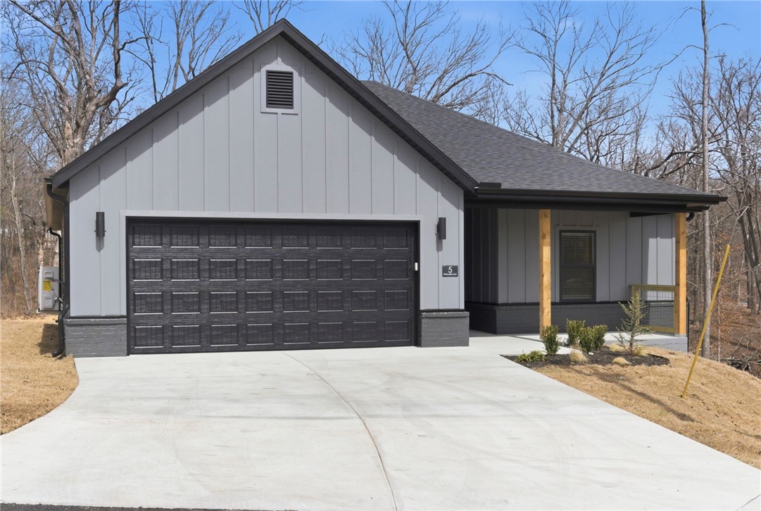 Brand new move-in ready home in Bella Vista backing to POA land for added privacy and peaceful wooded views! Located within walking distance to Branchwood Rec Center and minutes from the Back 40 Trail System, Little Sugar Trails, Highlands Golf & Pub, and Loch Lomond for boating, fishing, hiking, and biking. This 3-bed, 2-bath home features a bright open floor plan perfect for everyday living and entertaining. The kitchen has quartz countertops, modern finishes, a walk-in pantry and refrigerator, while the spacious primary suite features a huge walk-in closet. Enjoy the electric fireplace indoors and the flat lot outdoors. Built with quality and efficiency, the home includes ZIP System sheathing, hot water recirculation, a fully insulated 2-car garage, full guttering, installed blinds, and front landscaping. Less than 5 minutes to I-49 and approximately 20 minutes to the Walmart Home Office, offering comfort, convenience, and easy access to all Bella Vista and Northwest Arkansas have to offer.