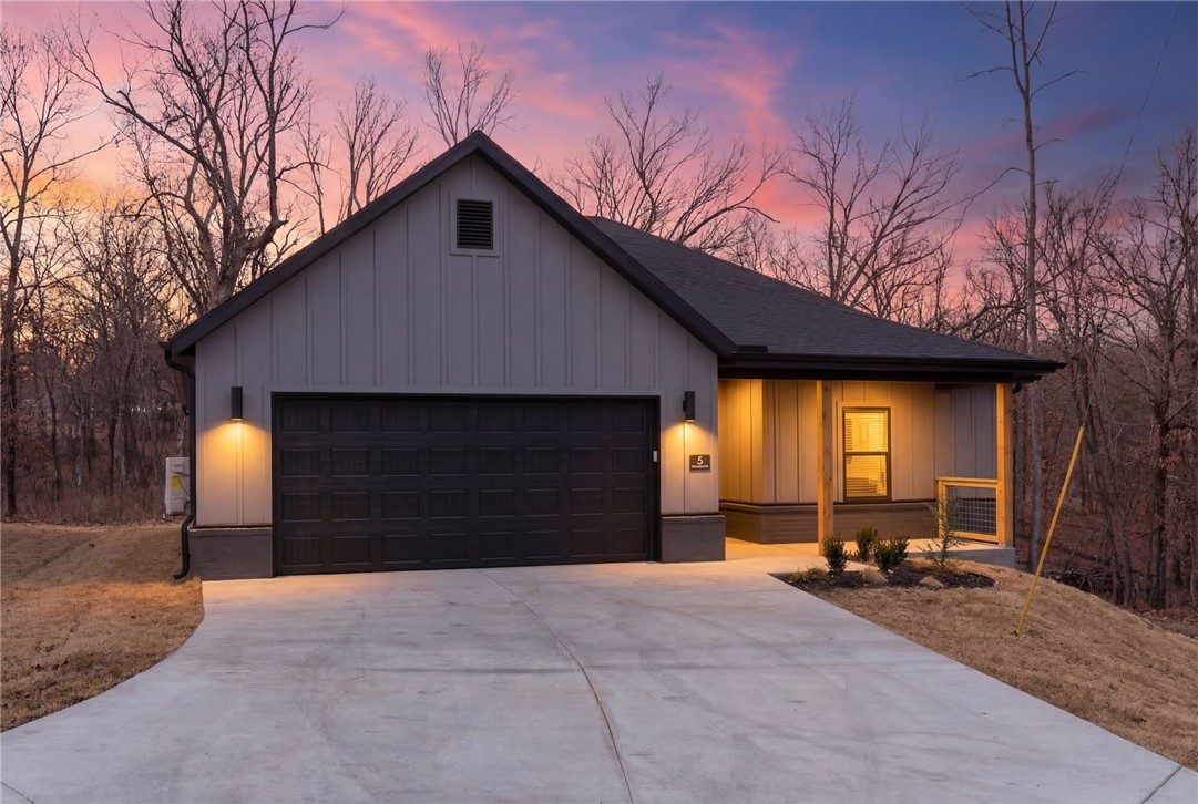 Brand new move-in ready home in Bella Vista backing to POA land for added privacy and peaceful wooded views! Located within walking distance to Branchwood Rec Center and minutes from the Back 40 Trail System, Little Sugar Trails, Highlands Golf & Pub, and Loch Lomond for boating, fishing, hiking, and biking. This 3-bed, 2-bath home features a bright open floor plan perfect for everyday living and entertaining. The kitchen has quartz countertops, modern finishes, a walk-in pantry and refrigerator, while the spacious primary suite features a huge walk-in closet. Enjoy the electric fireplace indoors and the flat lot outdoors. Built with quality and efficiency, the home includes ZIP System sheathing, hot water recirculation, a fully insulated 2-car garage, full guttering, installed blinds, and front landscaping. Less than 5 minutes to I-49 and approximately 20 minutes to the Walmart Home Office, offering comfort, convenience, and easy access to all Bella Vista and Northwest Arkansas have to offer.