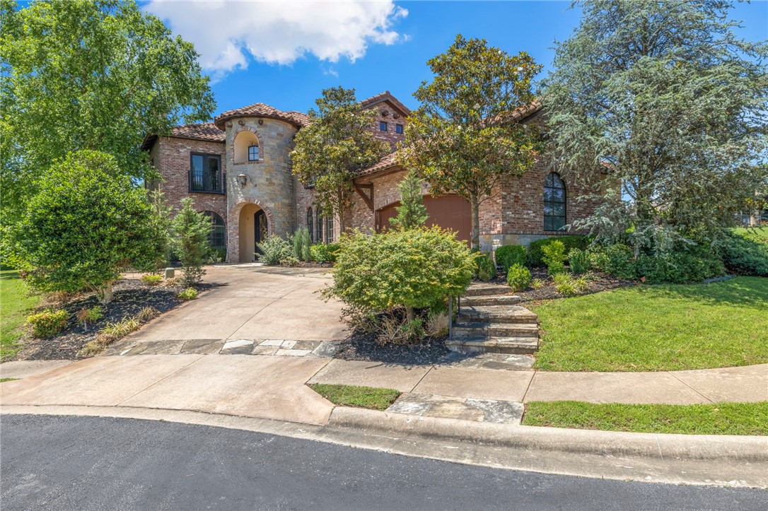 Magnificent Tuscan-inspired, custom-built home nestled on a quiet cut-de-sac on the patio side of the Blessings Golf Community. This home boasts Canadian white pine solid beams, venetian plaster covered walls, cast stone fireplace in the living room and custom lighting throughout. The primary bedroom with en-suite bathroom are on the lower level tucked away in their own tranquil space. The curved wooden staircase takes you upstairs to three bedrooms and an amazingly designed media/theatre/game room. Retreat to the outdoor patio with waterfall and fireplace for luxurious outdoor living.
All new flooring through out home and freshly painted