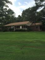 Custom Built Home on 12 acres with in ground pool,gazebo and mature landscaping. This home has 3 bedrooms,two bonus rooms that could be afourth bedroom.Breakfast nook,china hutch ,solid oak cabinets,and built in shelving .The property also has a guest house or mother- in- law quarters with full bath and kitchen area.New roof installed June 2015. new carpet, new counter tops .