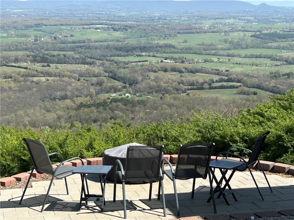 Set along beautiful scenic Orchard Point Road, this fully updated all-brick 3-bedroom, 2-bath home offers breathtaking valley views and peaceful Ozarks living at its finest. From the backyard, you’ll enjoy stunning panoramic scenery that makes every sunrise and sunset unforgettable.  Designed for both comfort and efficiency, the home features an 8KW solar system for eco-friendly living and lower utility costs. Inside, you’ll find stylish updates throughout with a warm, modern feel, along with quality finishes that make this home truly move-in ready. Additional features include a custom wine cellar, perfect for added character and entertaining space.
With incredible views, modern upgrades, and a serene setting, perfect for a forever home located close to Buffalo National River, Parks and Trails.