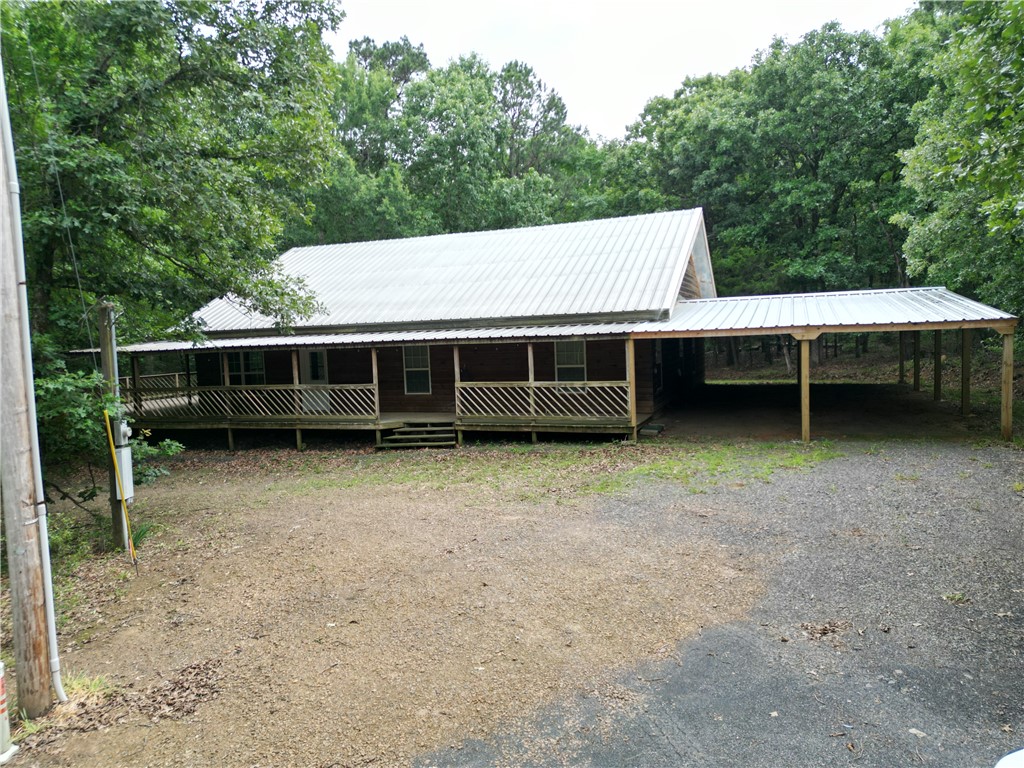 ?? PRIVATE RETREAT • HUNTING LODGE • AIRBNB DREAM ??
Escape to nearly 10 secluded acres of peace & quiet just minutes from Belleville and Danville! This unique property features a 40x40 electric shop and a 2,400+/- sq ft home built in 2006 with steel beams, wraparound porch, loft with pool table, laminate flooring, tiled accents, and all appliances conveying. A 4-car carport was recently added, making this property ideal for a hunting lodge, Airbnb, weekend getaway, or full-time country living. Tucked away with easy access to ATV trails, side roads, and outdoor adventure — this is the kind of property people dream about but rarely find!
Interior pictures coming soon!! Go ahead and schedule a private showing!