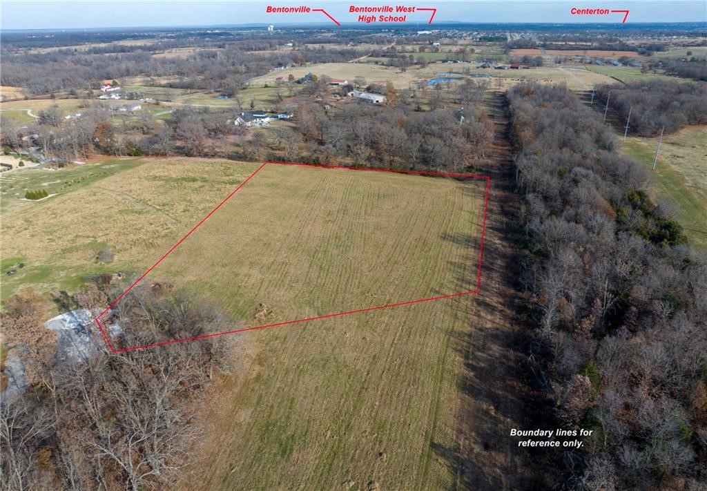 4.15-acre lot, ready for building your dream home! Mature trees line the back of the property for seclusion, yet open and easy to begin construction quickly. This platted-out subdivision is close to I49 and Bentonville, Bella Vista, and Centerton areas-only 16 minutes to the Walmart Home Office, 9 minutes to Bentonville West High School, and 15 minutes to XNA. Bentonville Schools! This property is truly centrally located to anywhere in Benton County. Covenants include no mobiles. Electric and Centerton Water available at street, septic required. Perc test available. Starlink Internet is available, too!
