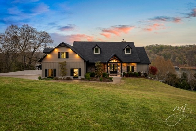 Make everyday a vacation day. Custom home on one of the best coves on Beaver (Big Coose) Lake front property with a wonderful view. This is a one of a kind! Less than 6 years old with open concept, walkout basement, outdoor kitchen, fireplace and gunite pool. Includes 2 slips in a 4 slip dock. Nothing like it on Beaver Lake. In a gated community, just 20 minutes from downtown Rogers.