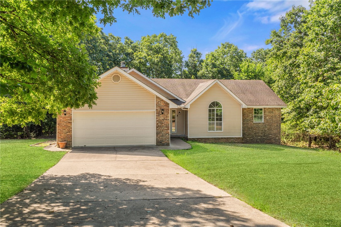 Welcome to this beautifully updated home in the highly sought-after Bentonville School District, perfectly located near Bella Vista’s renowned Back 40 Trail. Ideal for mountain bikers, hikers, and nature lovers, this home offers the best of Northwest Arkansas living. Inside, you’ll find granite countertops, stainless steel appliances, luxury vinyl plank flooring in the kitchen and dining areas, fresh paint, plush carpet, and updated kitchen and baths. Relax in the whirlpool tub or unwind on the spacious deck overlooking peaceful wooded views. The large, mostly flat, chain-link fenced backyard is perfect for pets, play, or entertaining. Additional features include a glass storm door and low-maintenance landscaping. Enjoy Bella Vista’s exceptional amenities, including golf courses, lakes, pools, fitness centers, tennis and pickleball courts, parks, and hundreds of miles of world-class biking and nature trails. Move-in ready and adventure-ready.