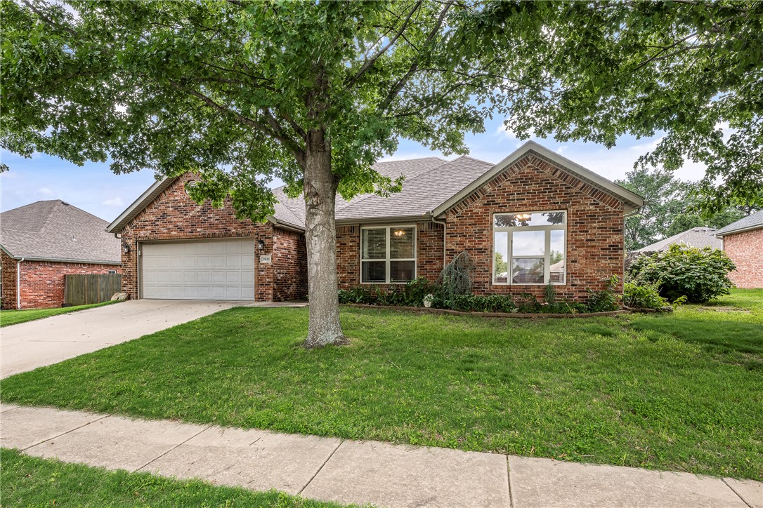 Welcome home to this inviting single-story residence featuring a cozy gas-log fireplace in the living room. The dining area flows seamlessly into the kitchen, creating a functional layout for everyday living and entertaining. Stainless Refrigerator, washer, and dryer convey with an acceptable offer. Enjoy a private, fenced backyard complete with a shaded pergola and deck—perfect for relaxing or outdoor gatherings. Outdoor enthusiasts will appreciate neighborhood access to the Clabber Creek Trail approximately one block away, along with nearby Salem Park and the future Underwood Park. Enjoy the convenience of the vibrant new commercial district at Mount Comfort Road and Salem Road. Located within walking distance of Holcomb Elementary School, Holt Middle School, and the Gary Hampton Softball Complex. Easy access to major destinations, with a 5-minute drive to I-49, shopping and daily conveniences, approximately 10 minutes to the University of Arkansas, and about 13 minutes to Washington Regional Medical Center.