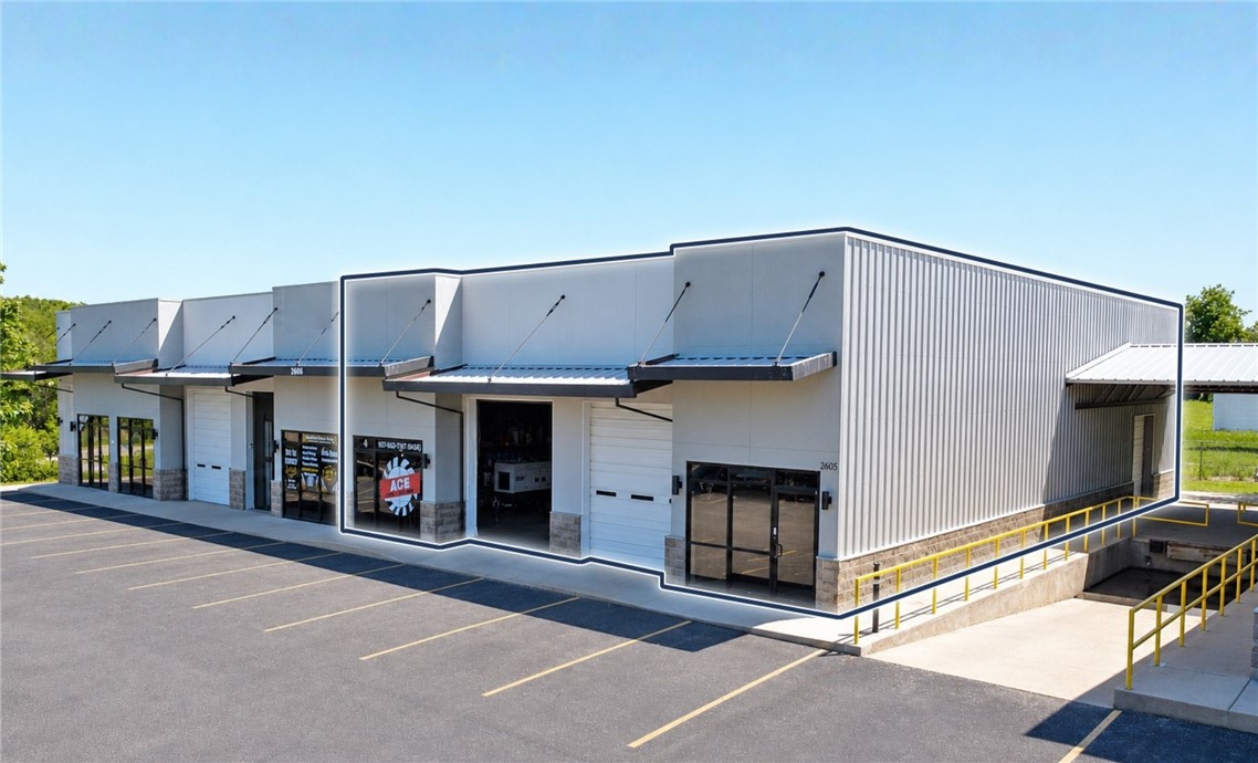 Available: 2,000 SF - 4,086 SF.
Rental rate: $14.00 PSF, NNN.
Grade level doors: 2 (12’ x 10’).
Dock level doors: 1.
Min wall height: 16’.
Peak height: 20’.
Parking: 6–8 spaces.
HVAC: Fully conditioned.

2605 Storage Parkway, Unit 4 in Rogers offers 2,000 SF - 4,086 SF of flex space with a functional layout ideal for a variety of industrial or service users, including approximately ±800 SF of office space. The space features full HVAC throughout, dock and grade-level access, a reception area, four private offices, and three restrooms. Conveniently located just a 2.9-mile drive to I-49, the property provides excellent accessibility within one of Northwest Arkansas’ fastest-growing commercial corridors.
