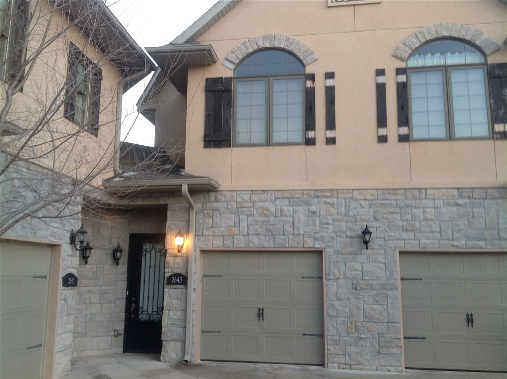 Check out this 2 bedroom condo that is minutes away from shopping, the AMP & much more! Each room has it's own bathroom. One car garage & nice floor plan.