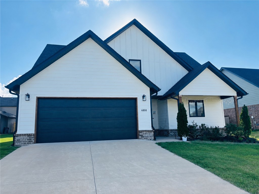 Discover elevated living in this stunning Bentonville home located in the sought-after Woodlands Crossing community! Offering 4 bedrooms, 2.5 bathrooms, and a thoughtfully designed floor plan, this home blends modern comfort with timeless style. The open-concept living space features a beautiful gas fireplace, luxury vinyl plank flooring, and abundant natural light. The kitchen is designed to impress with quartz countertops, custom cabinetry, stainless steel appliances, and designer finishes. The spacious primary suite provides a private retreat with a spa-like bath and custom closet features. Enjoy outdoor living with a covered patio, fully fenced backyard, irrigation system, and mature landscaping. Community amenities include a pool, playground, and walking trails. Conveniently located near Walmart Campus, I-49, shopping, dining, and everything Bentonville has to offer. Move-in ready and exceptionally maintained! Plus enjoy exceptional neighborhood charm and easy access to parks and daily conveniences nearby!