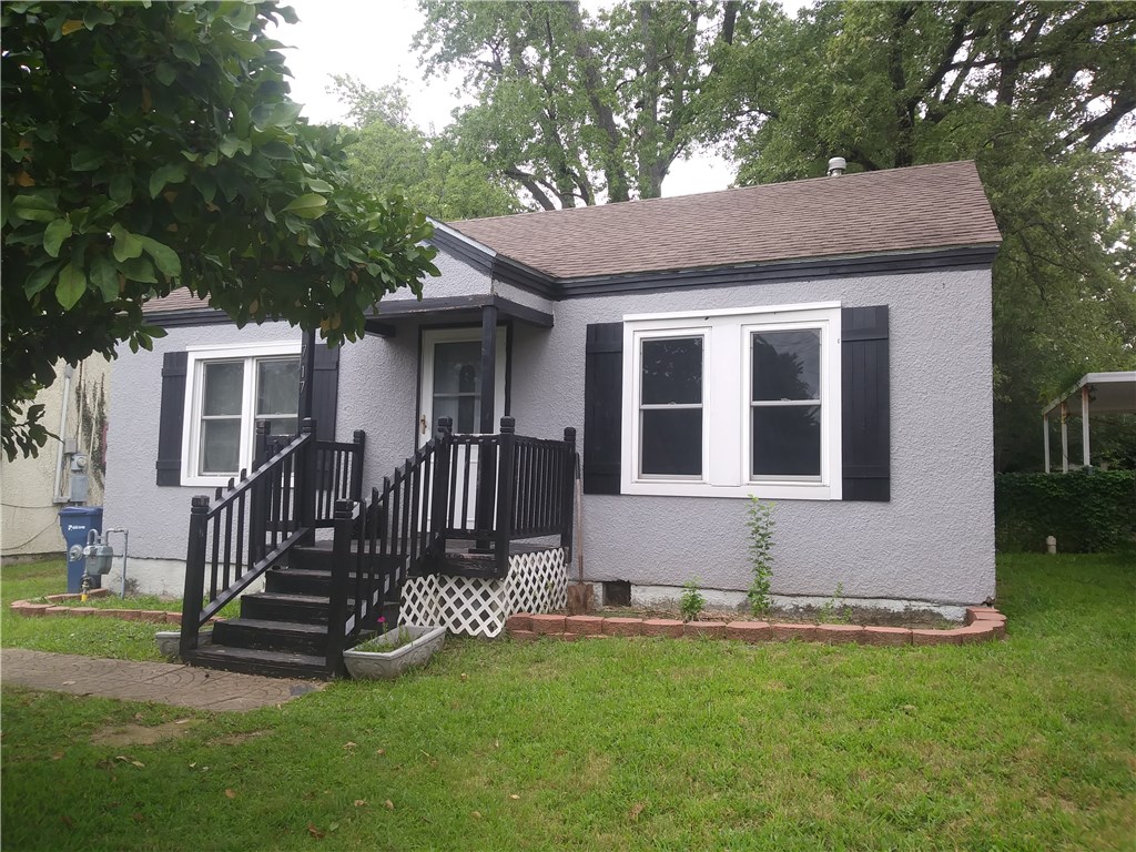 Cute little cottage with so many newer upgrades: New flooring in 2010, new roof in 2011, new C/H/A in 2012, updated electric in 2012, new vinyl windows in 2013, new kitchen cabinets, updated plumbing, sewer line in 2014, chain link fence in the back yard, low utilities with new insulation in the attic and walls. 10x12 storage building.  Hardwood floors under the vinyl.