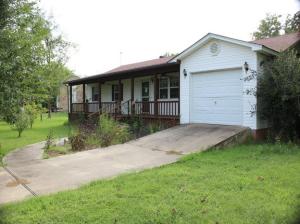 Large living, dining, and kitchen area. Large covered porch on front and back. Fenced backyard.