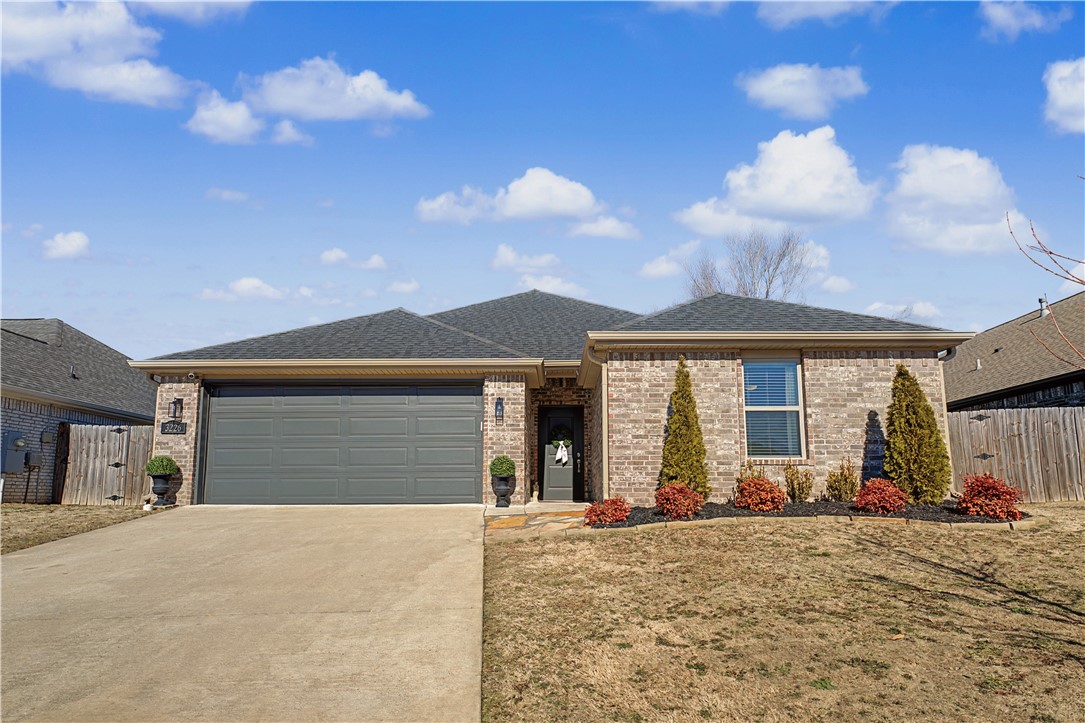 Welcome to this spacious one-level home in the desirable Summer View subdivision in East Springdale, offering an inviting open layout ideal for everyday living and entertaining. The large living area features a tray ceiling and updated corner gas fireplace and flows seamlessly into the kitchen and eat-in dining space with a stylish accent wall. The kitchen provides abundant counter space with granite countertops, newly painted cabinetry, pantry storage, undermount lighting, and stainless steel appliances including a gas range. The oversized primary suite offers a relaxing retreat with a generous bathroom featuring a jetted tub, walk-in tile shower, and an expansive walk-in closet. Luxury vinyl plank flooring runs throughout the main living areas, and the home also includes full gutters and thoughtful updates. Enjoy the private, fully fenced backyard with a covered patio perfect for relaxing or entertaining. This home is move in ready, schedule your showing today! Back on market due to buyer's financing!