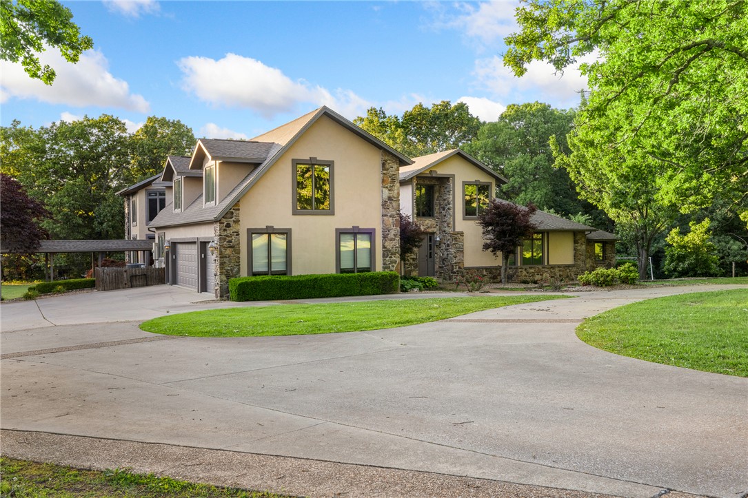 Luxury and Custom. She is all that. This Beautiful home on 4+ acres just north of town is built for both everyday living and entertaining. With nearly 8,000 sq ft, this home features 5 bedrooms, 5 baths, a large attached flex/shop space with 4 garage doors, wet bar, whole-home generator, and plenty of room for everyone. Main house is 5,491 sq ft, and guest house is 2,160 sq ft. Outside you’ll love the inground pool, outdoor entertaining area, fruit trees, garden space, and playground area with room to roam and enjoy the outdoors. A rare property that combines comfort, space, and all the extras that anyone would  dream about.