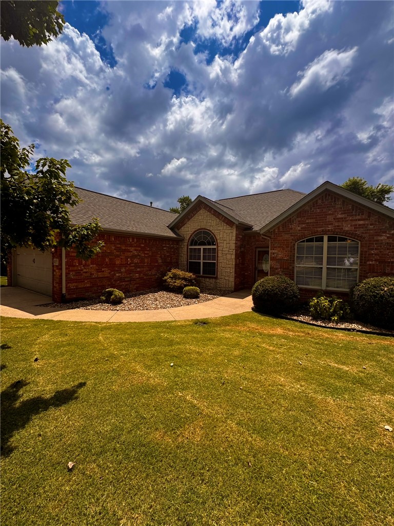 Beautifully updated 3-bedroom, 2-bath home in Rogers featuring fresh paint and new carpet throughout. The spacious living room offers a cozy fireplace, while the kitchen comes fully equipped with a dishwasher, range, microwave, and refrigerator. The primary suite includes a walk-in closet and a private sitting area, creating the perfect space to unwind. Outside, enjoy a large fenced backyard, complete with a storage shed for extra space. Conveniently located near shopping, dining, parks, and everyday amenities, this home offers a great combination of comfort, space, and convenience.**$250 non-refundable pet fee per pet - small pets only - under 25LB - Renter Insurance Required**