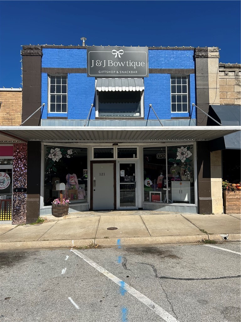 Endless possibilities await with this spacious commercial building located right on downtown Harrison Square! Featuring both ground-level and upper-level entrances, this property offers flexibility to operate multiple businesses or even create a live/work space. The versatile layout is perfect for a restaurant , retail shop, venue, gym, office space or boutique - the options are limitless. The lower level currently houses a boutique. With generous square footage, a new roof in 2022 and a prime downtown location, this property is an excellent investment opportunity or the perfect spot to run your own business. Owner Financing would be considered!