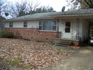 Welcome Home! ALOT of house for the money! This 3 bedroom home features a country feel but is close to town.  Hardwood floors under current flooring. Large kitchen and living area. LISTED BELOW APPRAISED Value for quick sale!Property to be sold AS IS