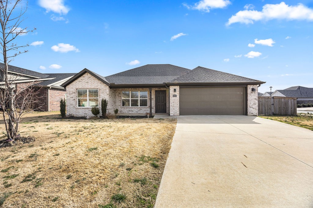 BRAND NEW ROOF END OF 2025 installation & NEW CARPET ENTIRE HOME March 2026. SOLAR INCLUDED WITH ACCEPTABLE OFFER. Welcome to your dream home in the heart of Tontitown, AR! This stunning **3-bedroom, 2-bath** residence combines modern efficiency with timeless style. Enjoy **fully solar-powered living**, offering sustainability and lower utility costs without sacrificing comfort. Inside, you’ll find **beautiful granite countertops throughout**, adding elegance to every space—from the kitchen to the bathrooms. The open-concept layout provides a seamless flow between the living, dining, and kitchen areas, perfect for entertaining or everyday living. Step outside to a **large, flat backyard** ideal for gatherings, gardening, or play. Situated on a **spacious corner lot**, this home offers extra privacy and curb appeal. Conveniently located near local dining, shopping, and top-rated schools, this property blends small-town charm with modern convenience. Move-in ready and built for the future—schedule your tour today!