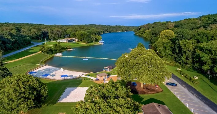 Walk or Mountain bike to the white sands of this Arkansas Beach at Lake Avalon.  This lot is only 0.8 miles away from your dream home.  Lot is in a cul-de-sec and backs up to "Uphill Both Ways" Mountain bike Trail... Bella Vista POA includes: 108 holes of golf spread among seven golf courses, a golf range/practice center, seven private lakes, swimming pools, tennis, pickleball and basketball courts, miniature golf and playgrounds, walking trails, a gun range, an RV park and campground, and fitness and recreation centers.