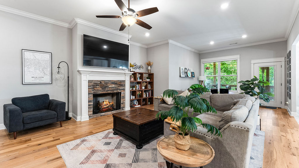 Rare opportunity tucked away on a quiet cul-de-sac in Bella Vista, this stunning one-level home offers versatility, style, and comfort! Featuring 5 bed and 3 bath, the property showcases an upgraded open-concept layout with granite countertops, custom finishes, and elegant crown molding, perfect for both comfortable living and effortless entertaining. Enjoy a covered back patio with peaceful, scenic views, ideal for relaxing or hosting guests. Located just minutes from Blowing Springs Park, premier mountain biking trails, the Metfield Golf Complex, and an extensive network of walking and biking paths, this home is perfectly positioned to enjoy the best of Northwest Arkansas. Previously used as a successful Airbnb, it presents an excellent opportunity as a primary residence, vacation home, or income-producing investment. With close proximity to shopping, dining, and everyday essentials along Bella Vista Hwy, and only 15 mins to Downtown Bentonville and Walmart HQ, this property offers convenience and lifestyle!