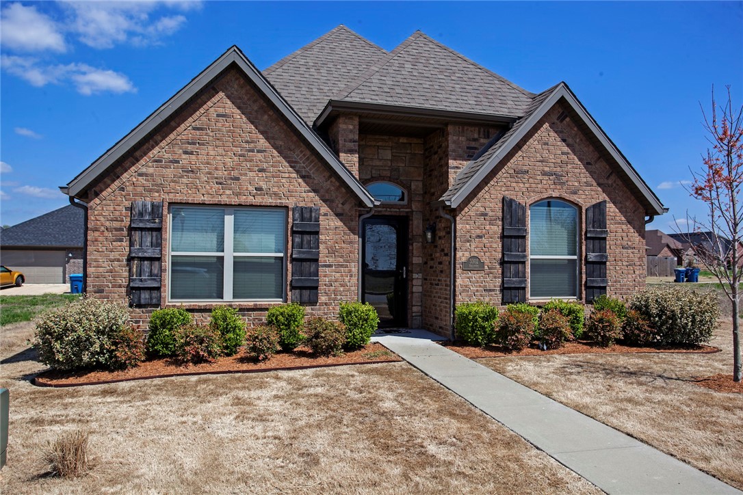 Great home in Bentonville. This 3 bedroom 3 full bath home has open floor plan, granite counter, hardwood flooring, fireplace in living room, stainless appliances, access to pool and Clubhouse. Lawn care included.
