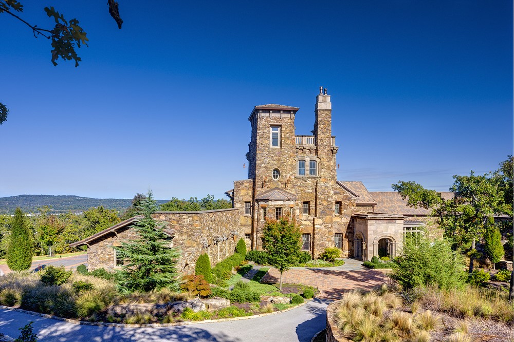 The Dromborg Castle, A State Treasure, featuring 3 levels, 5 bedrooms, 4.5 bathrooms, and stellar views! This home sits on +/- 34 Acres and features a pond with perch and catfish and a Small in-ground pool that has a potential to be heated. The flow of the Great Room, into the Kitchen is perfect if you like to cook while entertaining. A 1 car garage is also featured right off the Kitchen, making it easy to carry the groceries from the car straight into the kitchen! The Master Bed/Bath and 3 other bedrooms can also be found on the main floor. Get away from the crowd and head up to the 2nd floor family room for some quiet. The 2nd floor also features a bedroom, bathroom, and kitchenette. Ready to watch the sunset after a busy day? Head on up to the 3rd floor observation deck for the BEST views! Radiant floor heating throughout to help keep you nice and warm during the cold winter months. Live in a castle, build a spa/retreat, or turn it into a must-book event space! The possibilities are endless!