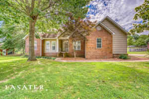 Take a look at this beautifully updated, one level, 3 bedroom 2 full bathroom home located in Harrison West. As you enter the front door you will love all of the natural light that floods into the foyer and bonus family room. The double French doors draw your attention outside to the backyard oasis featuring a swimming pool, retractable awning and new decking for all your entertaining desires! The heart of the home is the open concept living space that connects the living room, dining room and kitchen. You also have a bonus room off the kitchen that could be an office or formal dining room or made into a 4th bedroom! There is a wonderful gas fireplace with a fresh makeover, mostly new flooring, stainless appliances with gas stove and a very spacious 2 car garage with tons of storage