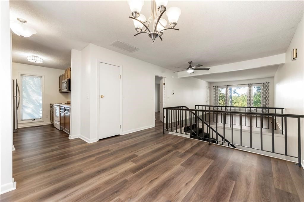 Affordable, end unit townhome! 3 bedrooms, plus a flex room.  2 dedicated, carport spaces. Easy to get to location, near Bella Vista Country Club, "Town Center" & Tanyard Creek. Have your own place to enjoy at a reasonable price. This would make a great Airbnb, or long term rental. Move in ready!  Come enjoy all Bella Vista offers! Mountain biking, lakes, golf, recreation centers, etc.