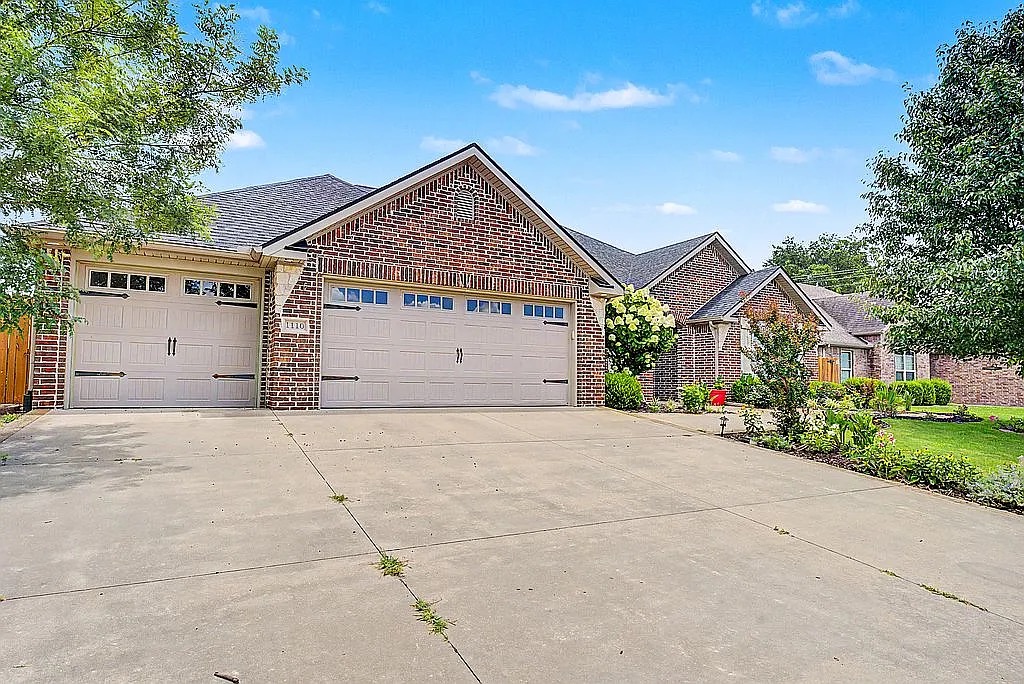 Welcome to 1110 Ellen Ray Lane in Centerton! This beautifully updated 4-bedroom, 2-bath home offers comfort, functionality, great location in Northwest Arkansas. The open floor plan features spacious living areas and a remodeled kitchen with large quartz countertops, updated sink, dishwasher, microwave, gas range, and two walk-in pantries, including a convenient butler’s pantry. The home also offers fresh interior paint, a 3-car garage, and a versatile finished bonus space with electricity and a mini-split, perfect for a home office, hobby room, she shed, man cave, or additional entertainment area. Enjoy the beautifully landscaped yard with flower gardens, established landscaping, and a private walking path creating a peaceful outdoor retreat for relaxing or entertaining. Conveniently located near Bentonville High School, parks, pickleball courts, Coler Creek, 8th Street Park, and downtown Bentonville. This home combines updates, location, and flexible spaces for modern living. No HOA! Schedule your showing today!