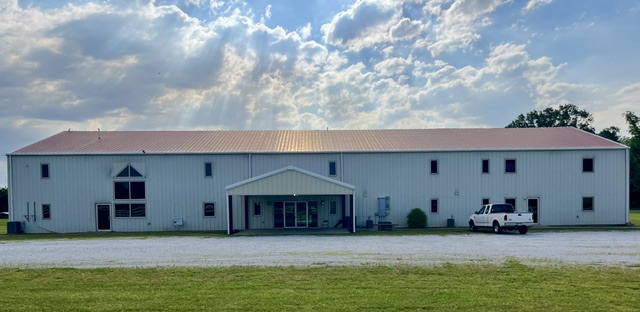 Multi-purpose building with many possible uses.  This 16,136 square foot building sits on 6.36 level acres inside Marshall, Arkansas city limits, visible from U.S. Highway 65. Nestled in the beautiful Ozark Mountains near the Buffalo National River. As a church it has a beautiful sanctuary, large fellowship hall and kitchen, sound booth, balcony, baptistry, restrooms, office space and classrooms.  The second floor has dormitory-type rooms, additional restrooms with showers and laundry hookup, meeting space, workout room, and more.  While it has been used as a church as recent as October 2025, and, lends itself to a new ministry, there are many possibilities for development. Other options to consider include school or college satellite campus, rehabilitation and recovery center, rental housing, commercial office space, industrial use, retreat and gathering place. New ministry or investment property with lots of development options.  MORE PICTURES COMING SOON.  CALL AND SCHEDULE A SHOWING TODAY.