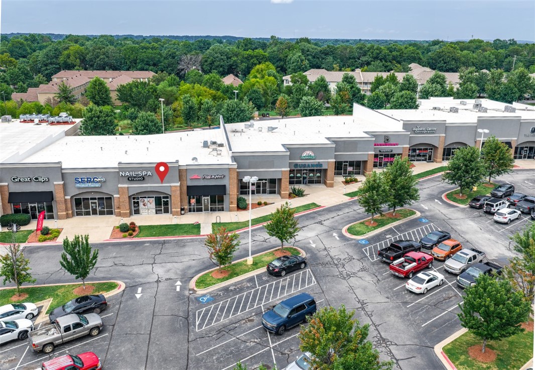 Established high-visibility shopping center anchored by Harps Food Stores offers strong daily traffic count and well-balanced tenant mix.  Excellent location for retail, office, medical, or service users.  Current tenants include Great Clips, Pizza Hut, SERC Rehabilitation, Classic Nails, Gusano's Pizza, and JJs creating consistent customer draw and crossover opportunities.