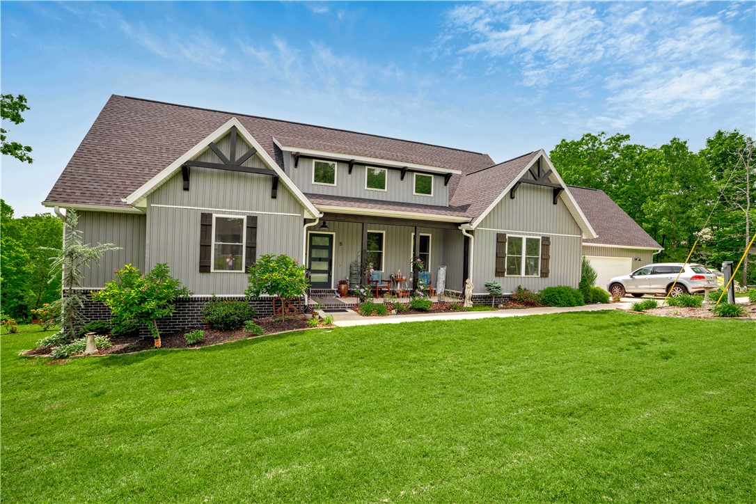 Beautifully designed Bella Vista home offering 3 bedrooms, 2 bathrooms, and two spacious bonus rooms that provide incredible flexibility for a home office, media room, or guest space. The bonus rooms are generously sized at 29' x 15'10" and 24' x 20'4", each equipped with their own mini-split systems for year-round comfort. This home features quartz countertops, abundant built-ins, and exceptional storage throughout. The kitchen includes a pantry and flows seamlessly into the main living areas, all enhanced by clean finishes and pull-down blinds for added convenience. Step outside and enjoy a true garden paradise, complete with thoughtful landscaping and peaceful outdoor living spaces. The expansive partially covered back porch, measuring 46'7" x 11'8", offers the perfect spot to relax while overlooking the beautifully maintained backyard. A rare combination of space, functionality, and charm in a serene Bella Vista setting.