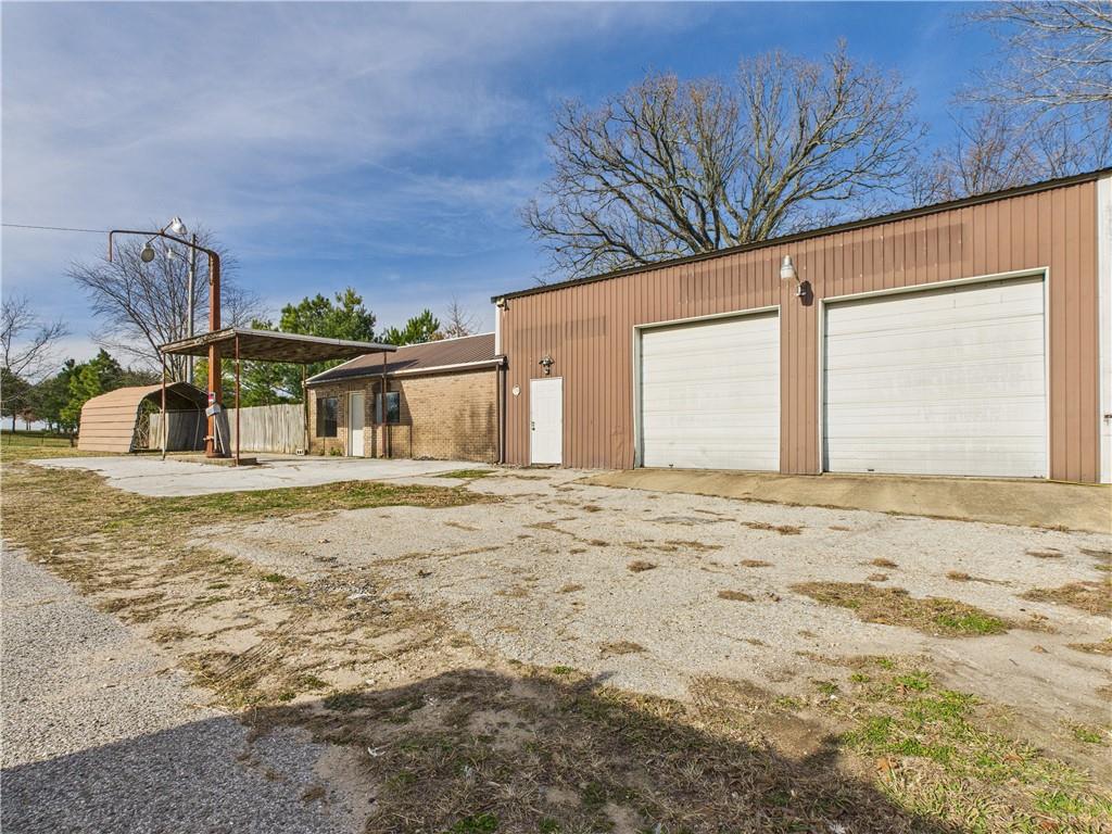 Remodeled 2 Bedroom Home with Garage Workshop & Highway Frontage This fully remodeled 2-bedroom, 1-bath home offers more than just comfortable living—it’s a rare opportunity for hobbyists or entrepreneurs alike. The attached garage is already outfitted with an automotive lift, tire changer, and air compressor, making it perfect for a hobby car enthusiast, mechanic, or anyone looking to run a small-scale business from home. Situated on high-visibility highway frontage, this property offers great exposure for a potential home-based business, while the privacy fence ensures you still enjoy peace and personal space in your backyard. Whether you’re looking to live, work, or both—this property delivers flexibility and functionality in one unique package. Don’t miss your chance to own this one-of-a-kind setup!