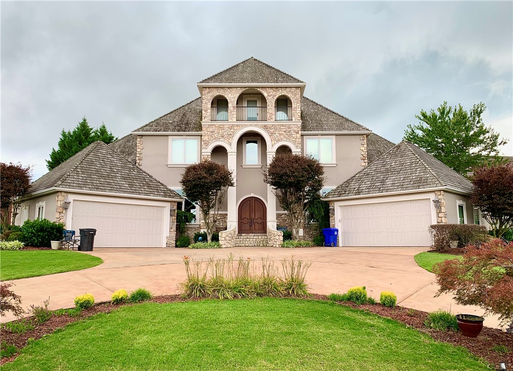Stunning Rogers Home in luxurious Pinnacle Neighbhorhood right on golf course! Walk into to discover this one-of-a-kind home -- Brazilian Wood floors, Italian travertine extensive trim, mosaic tiled dome ceiling, Lacanche Range-Art Culinaire. Perfect for entertaining with stunning salt water pool, waterfall, lush landscaping and sitting area. Bonus and Media Room's both include wet bar. Beautiful kitchen, large pantry and detail throughout home.