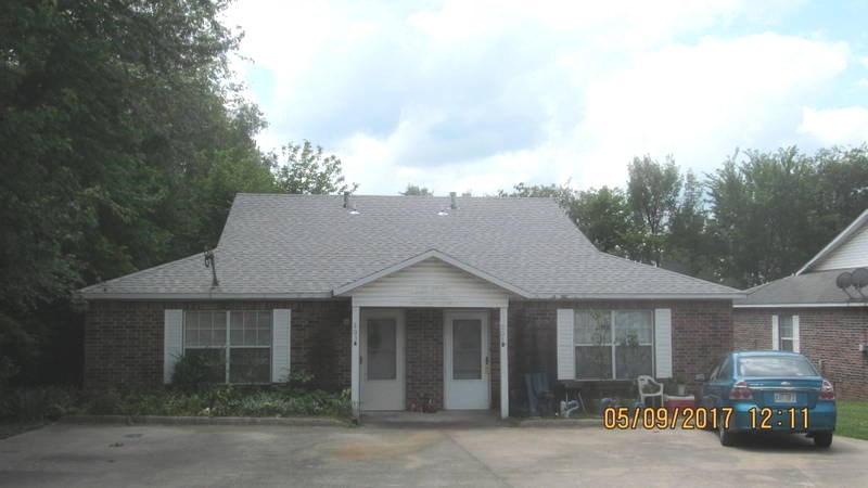Each side has 2 BR, 2 BA, concrete drive, tile floors. Established lot. new roof. Adjacent duplex at 207 W. Parks is available as well (see MLS 1047433).