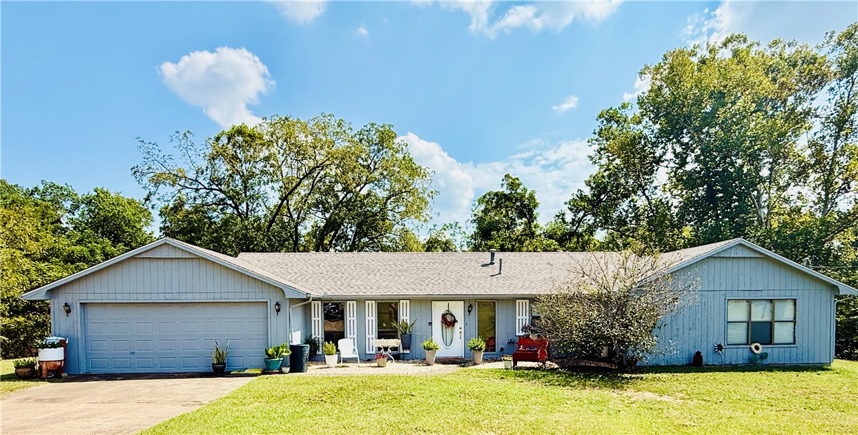 Rare find on the edge of Bentonville, just into Centerton! This 3-bedroom, 2.5-bath home offers over 2,700 sq. ft. of living space on 1.63 private acres at the end of the road. Featuring two living areas and a large formal dining room, this home has plenty of space for both everyday living and entertaining. Cozy wood-burning fireplaces are found in both the main living room and the primary suite.

Enjoy the outdoors with a deck off the living room and another off the primary bedroom, overlooking the large, flat backyard. The spacious kitchen, generous dining area, and oversized utility room with half bath add convenience and function. Property includes an attached 2-car garage plus a detached single garage—perfect for a boat, extra car, or storage. Set far off the road with a long concrete driveway and huge front yard, this property offers privacy and seclusion while still close to all Bentonville amenities. Also for sale Mls 1322507
https://maps.app.goo.gl/jGaNdQfLsLLLmbnn6