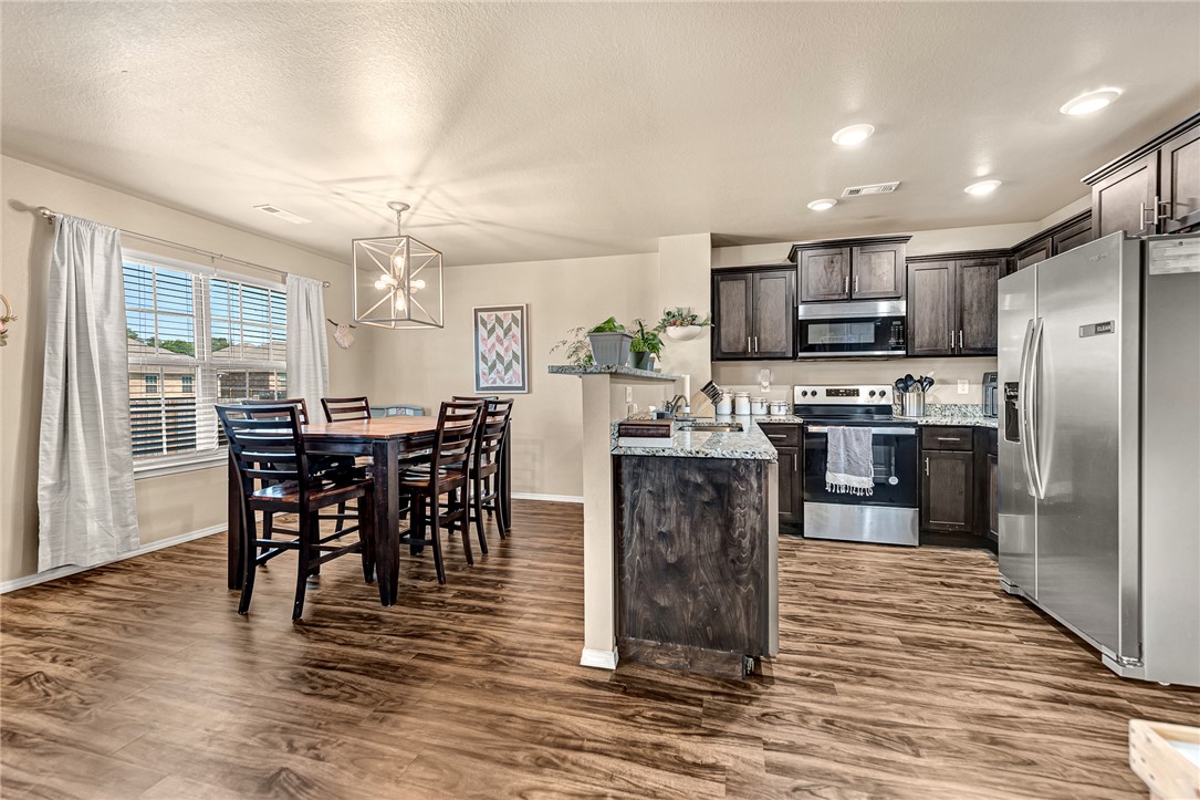 Welcome to Sunset Ridge! This gorgeous home sits on a highly desirable corner lot and features beautiful new light fixtures (updated in 2025). The bright, open kitchen boasts sleek granite countertops, an incredible double pantry for maximum storage, and a stainless steel refrigerator that conveys!
Retreat to the oversized primary suite, offering a generous layout with plenty of space for king-sized furniture and a great walk-in closet.
Outside, the sellers thoughtfully extended the wood privacy fence to create a massive, expanded backyard on this 0.28-acre lot—perfect for pets, play, and summer entertaining. Excellent turn-key Gentry location close to local schools and parks!
Home has foundation warranty.