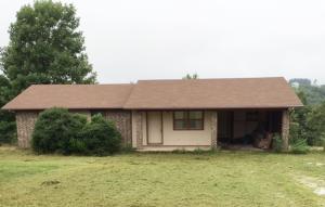 $79,900. Located on Hwy 43 S. Country setting, but just minutes from downtown Harrison. This one story ranch style home has 3 bedrooms and 11/2 baths, a single carport, covered deck off the kitchen and is plumbed for a gas fireplace. The kitchen features raised panel cabinets throughout.