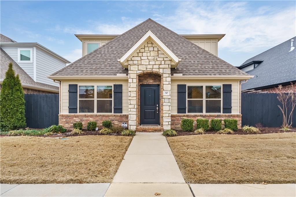 Are you looking for a 4 bedroom home to rent for the upcoming University of Arkansas year or for your family? Whatever your reason, here it is! Downstairs you will find an open living concept with an open kitchen with island with room for bar seats, lots of granite counter space, plenty of cabinets and dining area. A half bath for guests and laundry room comes with washer and dryer, both just off the kitchen. Primary bedroom with ensuite on main floor. Hang out on patio around firepit under pergola in fenced area for privacy. Upstairs adds 3 more bedrooms, one having an ensuite, while other two share J and J bathroom. The top of the stairs landing great for a study area or a kitchenette. Prime location in Fayetteville gets you to shopping, local dining and 2.2 miles (less than 10 minutes) from U of A. Home comes with all appliances, including washer, dryer and fridge, and lawn care is taken care of by HOA. Swim in the community pool that is just around the corner. Available NOW May 1, 2026 and sorry please no pets.