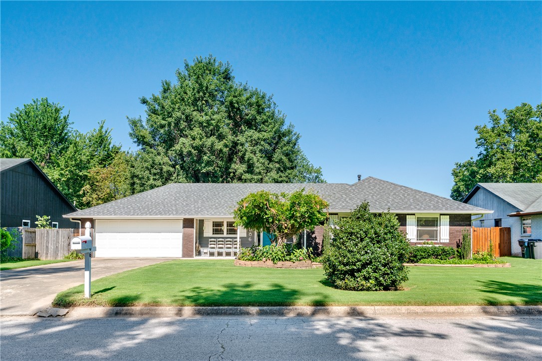 Skip the cookie-cutter neighborhood and enjoy the charm of mature trees, generous lots, and a beautifully updated 3 bed, 2 bath home in the heart of Rogers, just moments from I-49. Pella double-hung windows were installed throughout the home in 2018–2019, along with additional attic insulation, including the garage, to enhance energy efficiency. A spacious living area flows seamlessly into the dining space and a well-equipped kitchen featuring a convection microwave, a vent hood that vents directly outside, and both gas and electric hookups for the range, while the primary suite offers a private en-suite bathroom and walk-in closet. Step outside to a fully fenced backyard designed for both relaxation and entertaining, complete with a cozy fire pit and flower beds equipped with an automatic timed drip irrigation system for easy, low-maintenance watering. Conveniently located near shopping, parks, trails, schools, and daily amenities, this move-in-ready home offers comfort in a prime Rogers location.