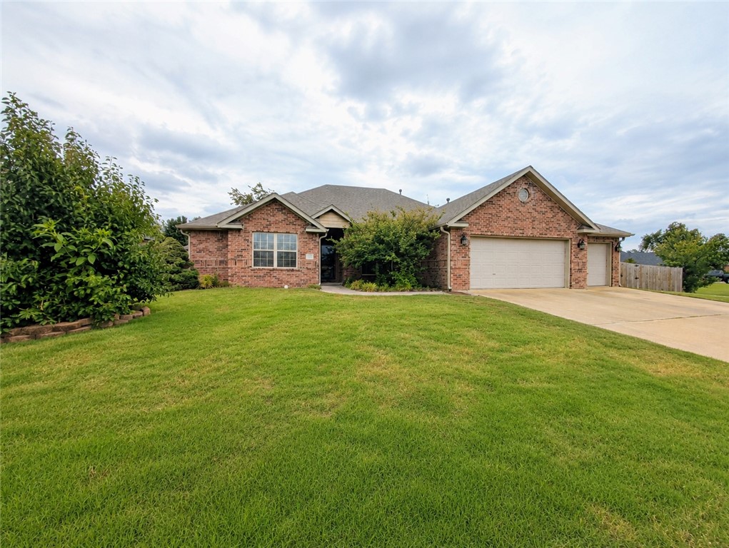 Looking for a 4 bedroom, 3 bath home, and a 3 car garage in an established neighborhood close to all Springdale and Fayetteville have to offer?! This one is it! This all brick home on an oversized lot has plenty to offer. Sellers added New high efficiency Hvac in 2025 and new roof in 2022. Some highlights include extended back patio, wood floors throughout main area, tall ceilings, large primary suite, formal dining and eat in kitchen space, and great windows/natural light just to name a few. This Is the perfect home to host game nights, bbqs, and enjoy the amazing outdoor space! Come check it out!