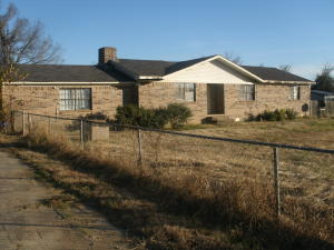GREAT INVESTMENT PROPERTY!!!!BRICK HOUSE, 3 BDS. 3 BTHS. LIVING ROOM  2 CAR GARAGE, PLUS A LARGE DEN, WOOD DECK, FENCED,12X40 METAL BLG. PLUS A 12X20 WOOD SHED ALL ON 1.02 ACRES.NEEDS REPAIRS