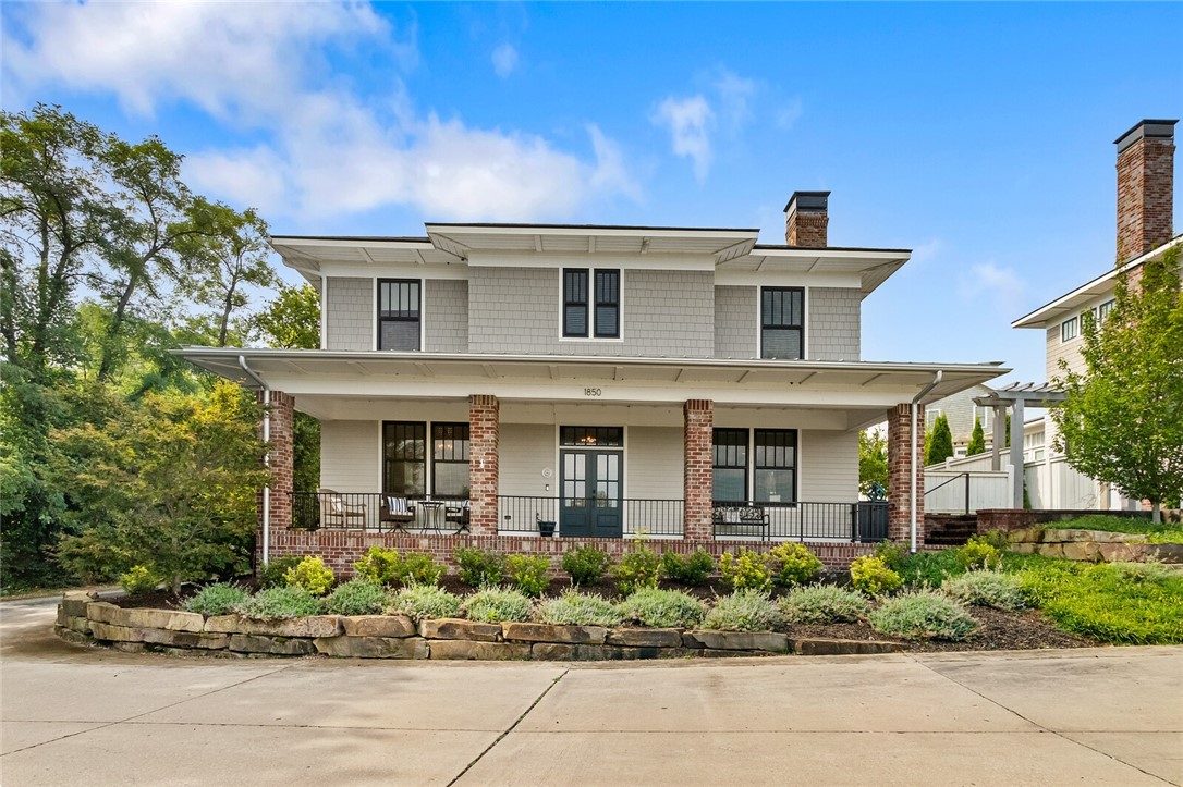 The American Craftsman FourSquare is a timeless design with incredible details. The front porch alone makes this home a showstopper. Overlooking the Nature Area and the future razorback greenway, with a quiet private alley as your streetscape, allows you the utmost in privacy. Open floor plan designed for entertaining.  Four bedrooms all upstairs making for an efficient use of space in this size home.  Media room is located on main level with full bathroom right off of it could be used as main level master. Custom storage built in the garage. Extra parking space around back. One of the very few houses in Mission heights with a true fenced in yard. You won't want to miss this one.